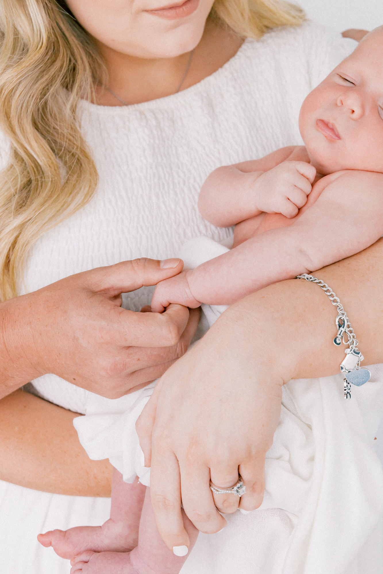 mom looking down at baby by fort worth family photographer cynthia knapp