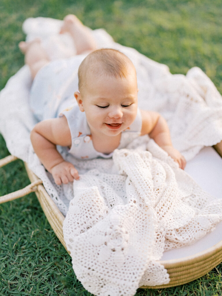 Baby basket photos baby smiling at sunset