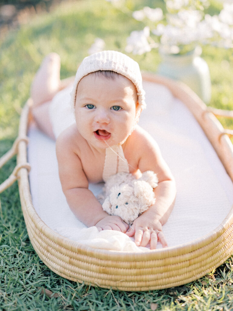 Baby basket photos Baby with bonnet on