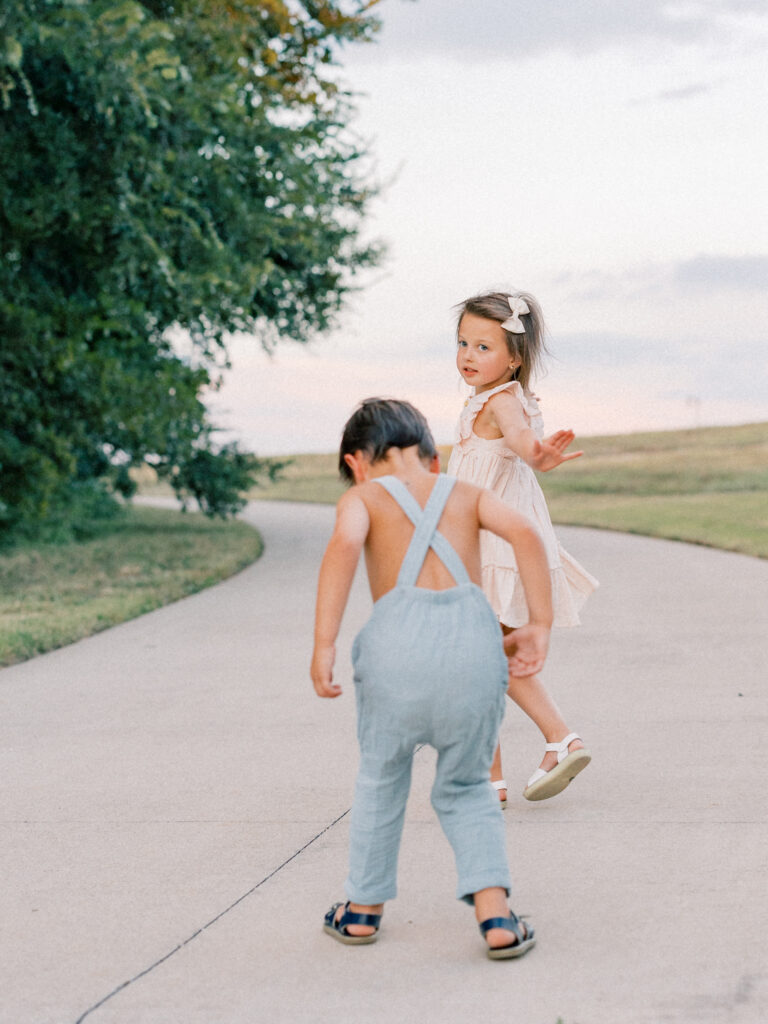 Brother and sister dancing at sunset session by Cynthia Knapp Photography